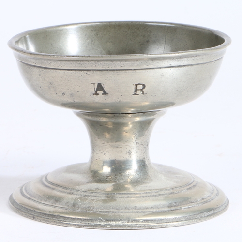 185 - An early 19th century large pewter cup salt, English, circa 1800-40

 With moulded lip, above the ow... 