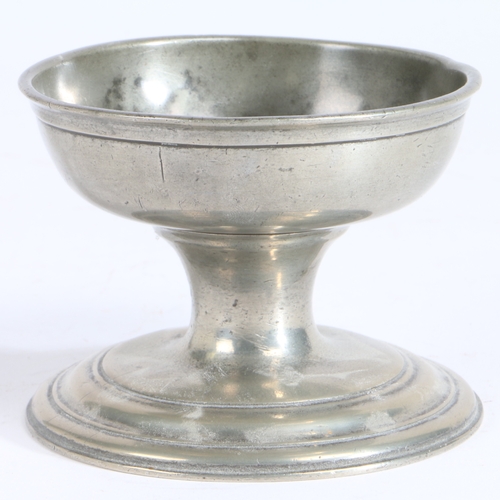 185 - An early 19th century large pewter cup salt, English, circa 1800-40

 With moulded lip, above the ow... 