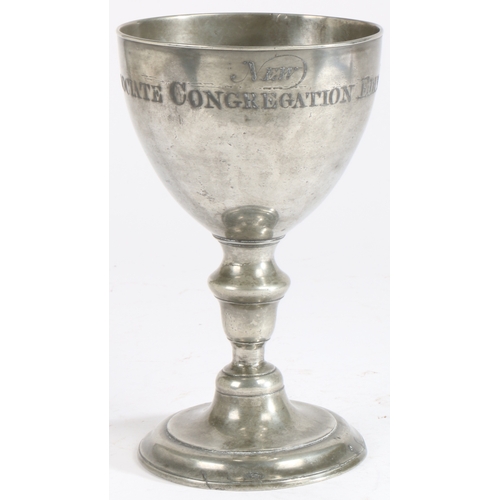 196 - A George III pewter communion cup, Scottish, dated 1795

 Having a large bowl, on an inverted acorn-... 