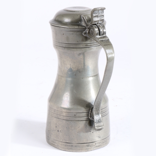 216 - A George III pewter mutchkin tappit hen, Edinburgh, circa 1800

 The body of typical shouldered form... 