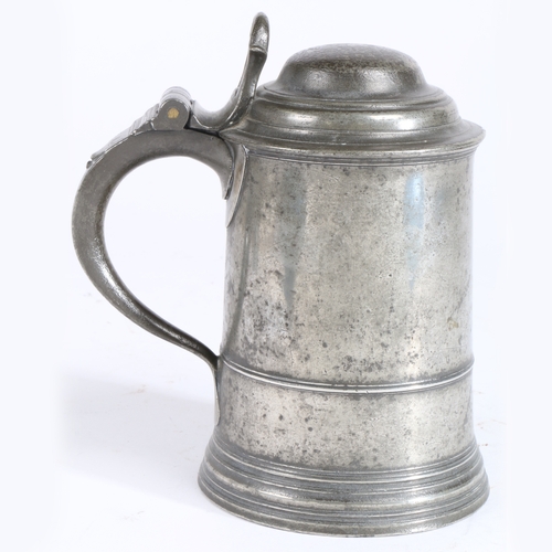 217 - A rare George I/II pewter OEWS quart domed-lidded tankard, circa 1720-30

 The straight-sided taperi... 