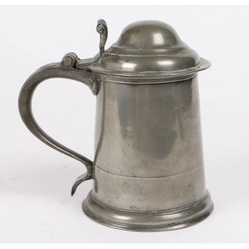 219 - A Queen Anne pewter OEWS quart high domed-lidded tankard, circa 1710

 The straight-sided tapering d... 