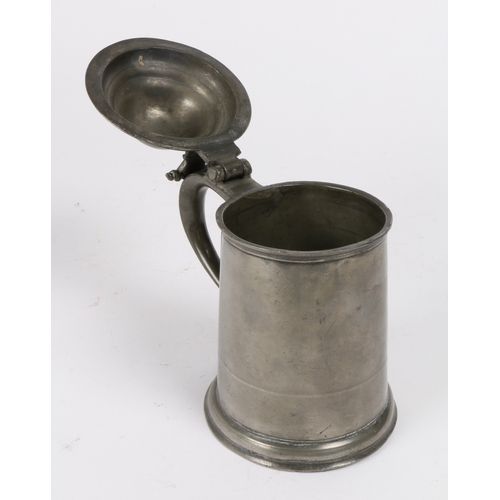 219 - A Queen Anne pewter OEWS quart high domed-lidded tankard, circa 1710

 The straight-sided tapering d... 