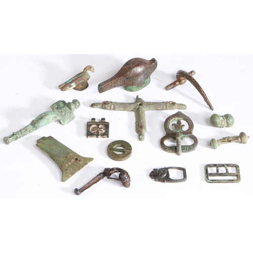 247 - A collection of Anglo-Saxon/Medieval copper-alloy artefacts

 To include clothes fastenings, hooks, ... 