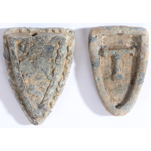 254 - Two 14th to 16th century lead trade weights, English

 Each of shield-shape, one cast with the Plant... 