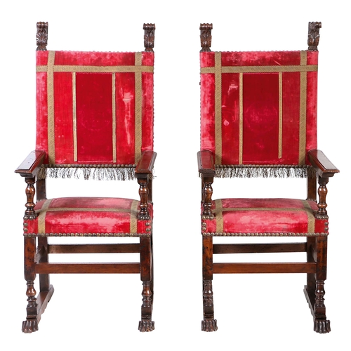 259 - A pair of large late 16th century walnut and upholstered armchairs, French, circa 1600

 Each having... 