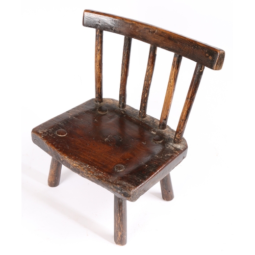 278 - A George III ash and possibly elm child's stick-back chair, Welsh, circa 1800-20

 The back of five ... 