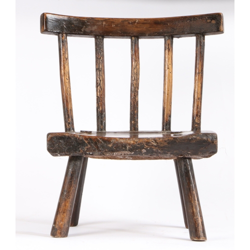 278 - A George III ash and possibly elm child's stick-back chair, Welsh, circa 1800-20

 The back of five ... 