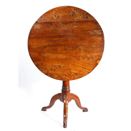 295 - A George II solid yew tripod occasional table, circa 1750

 Having a circular four-plank tilt-action... 