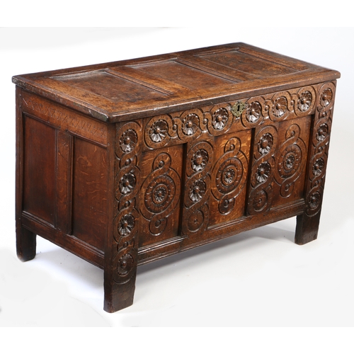 296 - A Charles I joined oak coffer, West Country, circa 1640

 Having a triple-panelled lid, the front ag... 