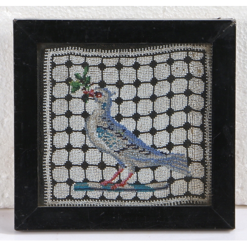 302 - A small 18th century beadwork picture of a dove

 The dove holding an olive branch within its beak, ... 