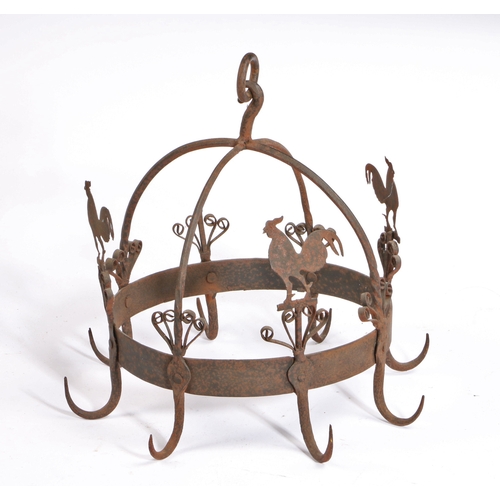 324 - An 18th century style wrought-iron game crown-hanger

 Of typical domed cruciform design, with hangi... 