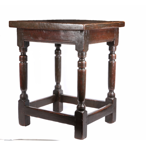 340 - A Charles I oak centre table, circa 1630

 Having an impressively thick one-piece top, the rails wit... 