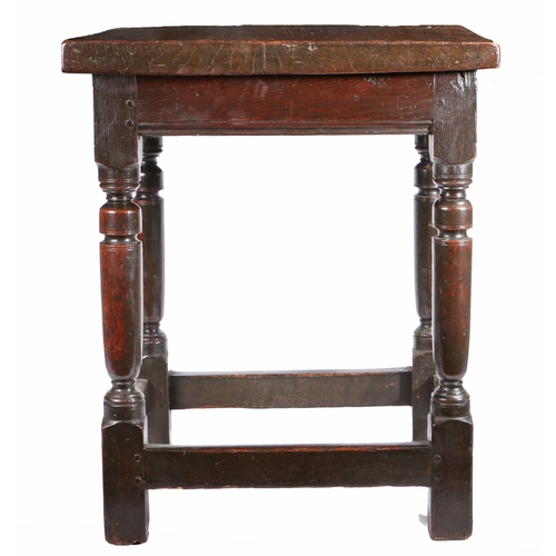 340 - A Charles I oak centre table, circa 1630

 Having an impressively thick one-piece top, the rails wit... 