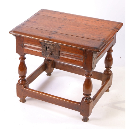 342 - A comparatively large Charles II oak box-stool, circa 1660

 Having a rectangular ovolo-moulded hing... 