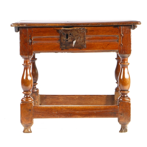 342 - A comparatively large Charles II oak box-stool, circa 1660

 Having a rectangular ovolo-moulded hing... 