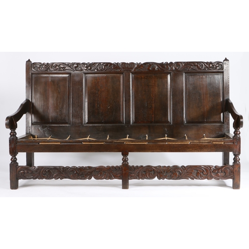 346 - A Charles II oak settle, Cheshire/Lancashire, circa 1670

The rectangular back of four fielded panel... 