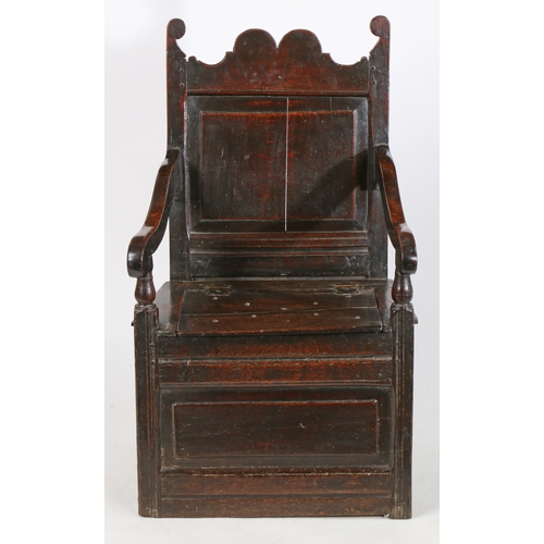 368 - A Charles II oak box-seat open armchair, North Country, circa 1680

 Having a rectangular fielded ba... 