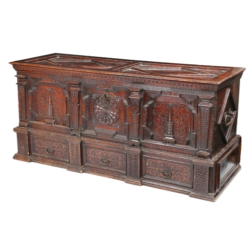 390 - A good mid-17th century pine/cedar chest, ornately carved, stained and dated 1648

 Of show dove-tai... 