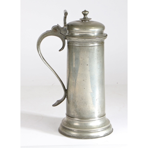 40 - A large and impressive Charles I pewter flagon, circa 1630

 Having a plain drum with ovolo footrim,... 
