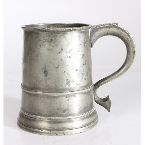 43 - A rare George I pewter straight-sided pint mug, circa 1725

 With raised low band to tapering drum, ... 
