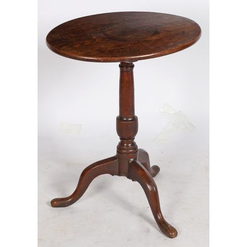 495 - A George III oak tripod occasional table, circa 1780

 Having a tilt-action, oval, one-piece top, a ... 