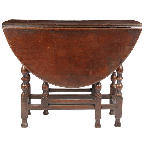 514 - A William & Mary oak gateleg table, circa 1690

 Having an oval drop-leaf top, formed mainly from br... 