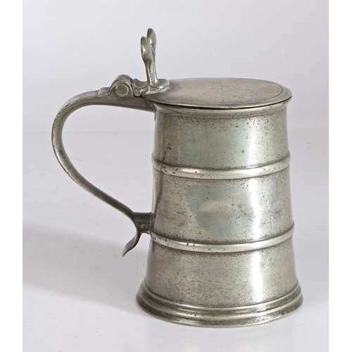 59 - A William & Mary pewter OEAS pint flat-lid and double-banded flagon, circa 1690

 The lid with under... 