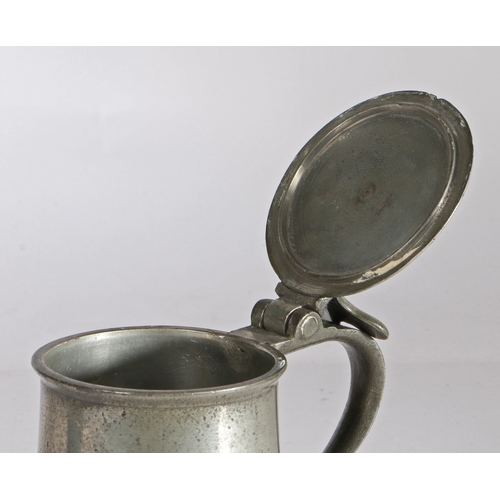 59 - A William & Mary pewter OEAS pint flat-lid and double-banded flagon, circa 1690

 The lid with under... 