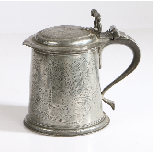 64 - A documented Charles II pewter wrigglework flat-lid tankard, Warwickshire, circa 1680

 The flat lid... 