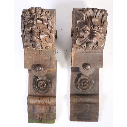 658 - A pair of large 19th century oak corbels, in the 16th century manner

 Each carved with a Green Man ... 