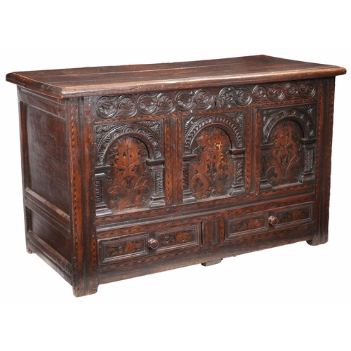 728 - A Charles II oak and inlaid coffer, with drawer, Yorkshire, circa 1660

 Having a triple boarded hin... 