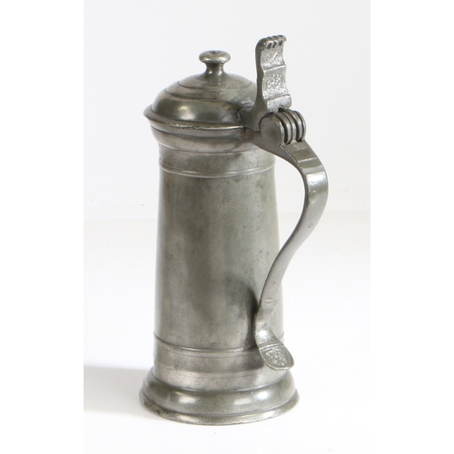 94 - A rare 'James I' pewter flagon, unusually with touchmark and cast decoration, dated 1629

 Having ... 