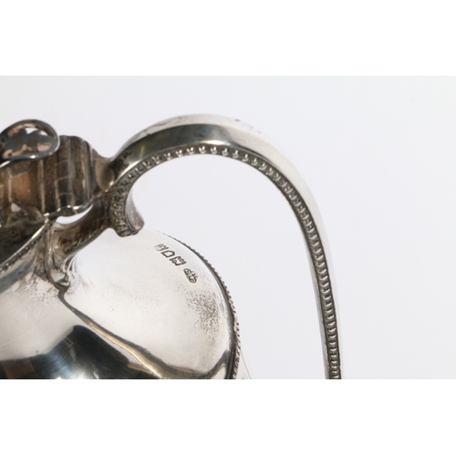 1 - A George V silver mounted clear glass claret jug, London 1914, maker Goldsmiths & Silversmiths Compa... 