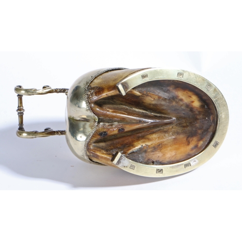 24 - A Victorian horse hoof inkwell, having a silver plated horse shoe mount, scrolled pen holder and hin... 