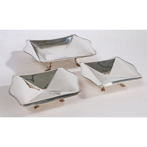 31 - A set of three George V silver dishes, Sheffield 1925, maker John Round & Son Ltd. of rectangular fo... 