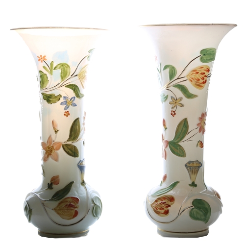 57 - A pair of mid 19th Century Baccarat opaline glass vases, with raised polychrome floral decoration, 2... 