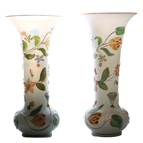 57 - A pair of mid 19th Century Baccarat opaline glass vases, with raised polychrome floral decoration, 2... 