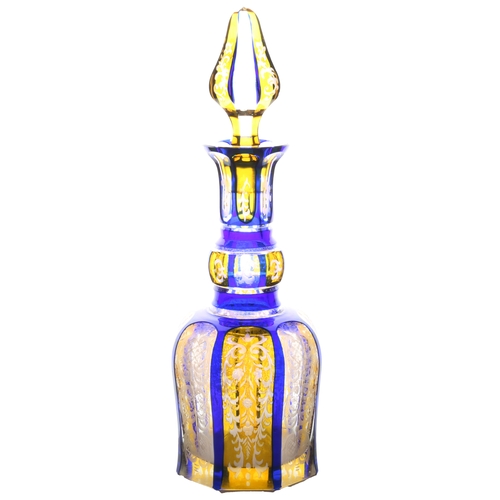 58 - A good 19th Century Bohemian glass decanter, in blue and yellow with scrolling leaf and flower decor... 