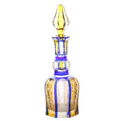 58 - A good 19th Century Bohemian glass decanter, in blue and yellow with scrolling leaf and flower decor... 