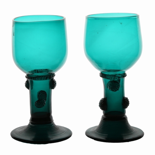 60 - A pair of  English 18th Century green roemer glass, circa 1780, the cup with multi applied raspberry... 