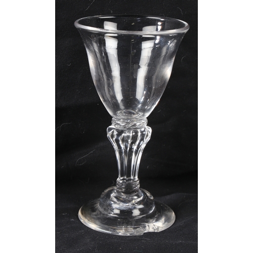 68 - A Georgian air twist stem wine glass16cm high together with two further Georgian glasses, all with c... 