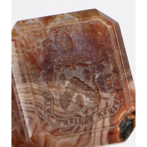 74 - A 19th century agate desk seal, set with a coat of arms, 6.5cm long