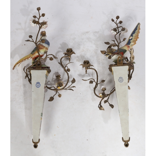 83 - Pair of Meissen style porcelain and gilt metal mounted wall sconce, both with modeled birds of parad... 