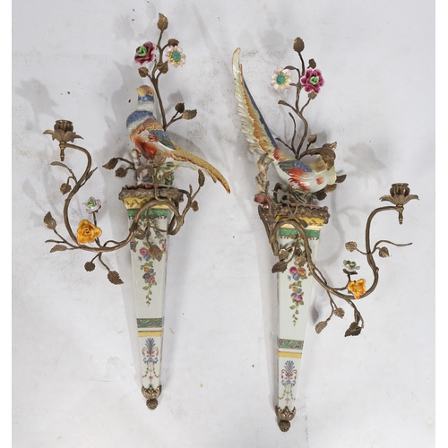 83 - Pair of Meissen style porcelain and gilt metal mounted wall sconce, both with modeled birds of parad... 