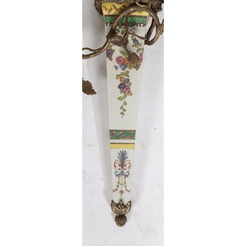 83 - Pair of Meissen style porcelain and gilt metal mounted wall sconce, both with modeled birds of parad... 