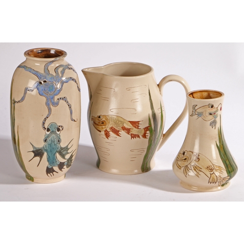 89 - Group of three Burslem Pottery wares comprising two vases and a jug, Grotesque Fish decoration, desi... 