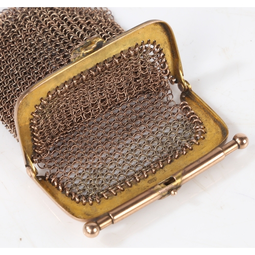 112 - A 9 carat gold chain-link coin purse, with push opening mechanism above the chain-link body, 48.5mm ... 