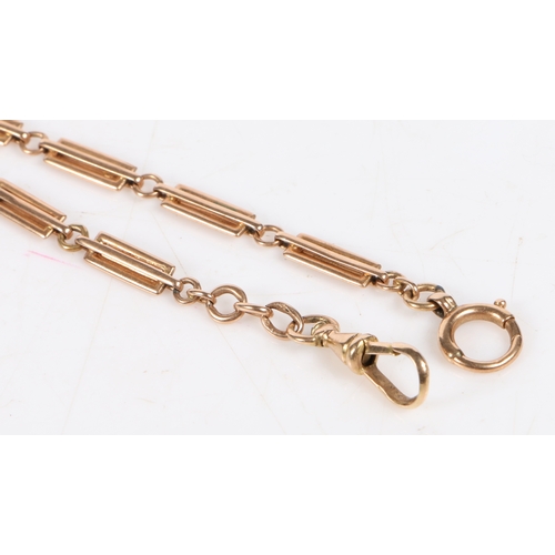 117 - A yellow metal pocket watch chain, formed from rectangular links with a clip to each end, marks rubb... 