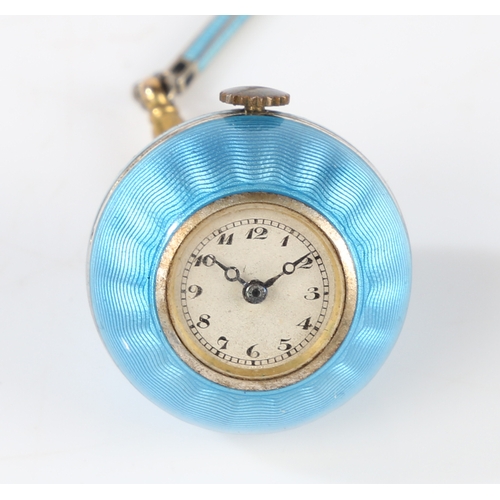 123 - A Continental silver and turquoise enamel orb form pendant watch and chain, the white dial with Arab... 